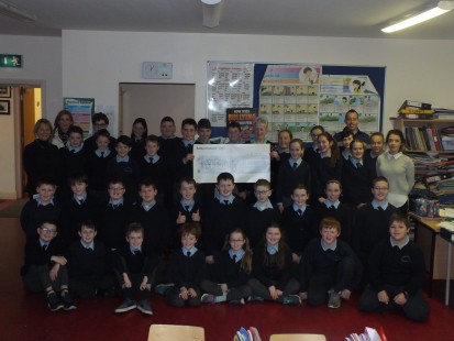 5th Class, 6th Class & Trad Group presenting cheque for €350 to Breda Culleton for Saint Vincent de Paul
